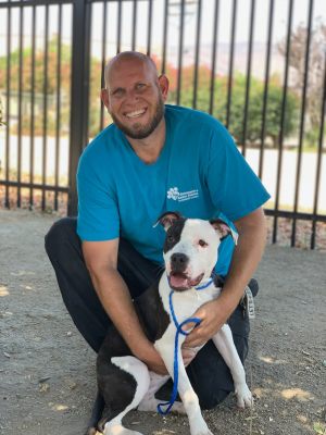 Ryan Long with A-1635984-female pit bull mix-10 mos old