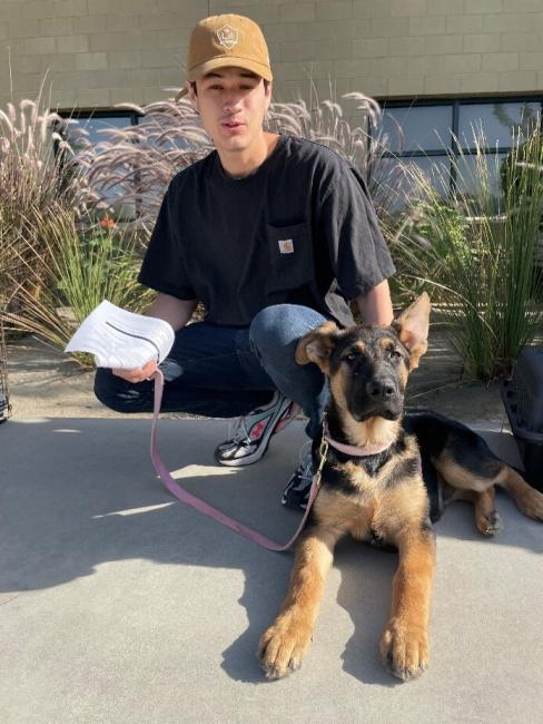 Charly, a four-month-old German Shepherd and his owner, wait in line at the free spay and neuter event at the Coachella Valley Animal Campus on Friday, April 25th, 2025.
